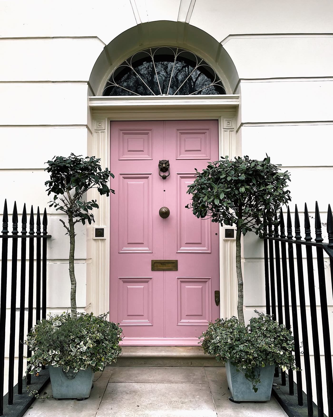 Light Up Topiaries on Both Sides of the Door