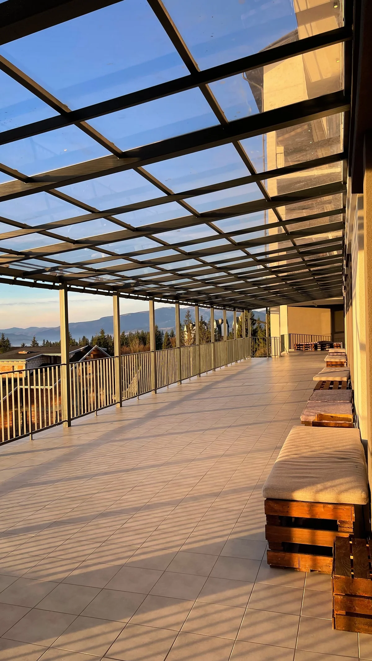 Glass roof section on gable patio cover for natural skylight