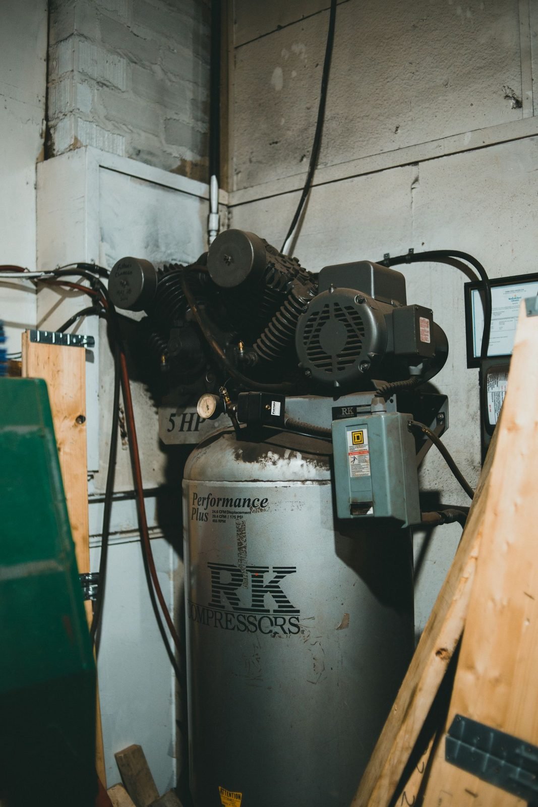 Air compressor in a workshop for blowing out water lines