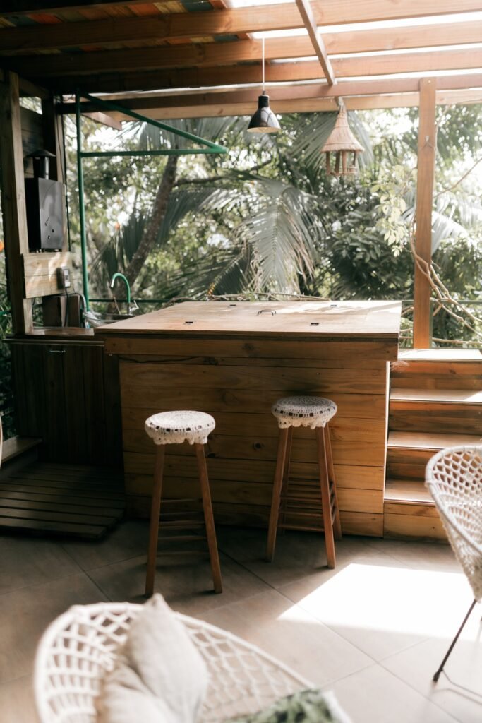 Outdoor patio bar ideas — wooden outdoor bar with stools