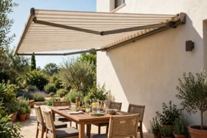 Wall-mounted lateral-arm retractable patio canopy extended over outdoor dining set